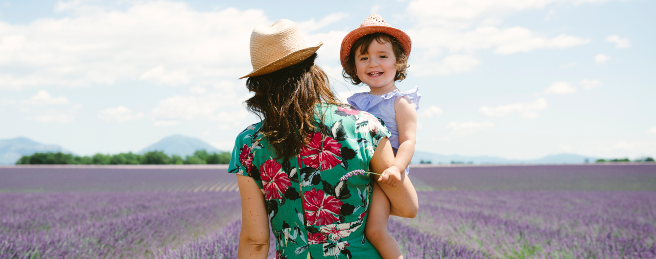 Mother and child overlooking lavender field